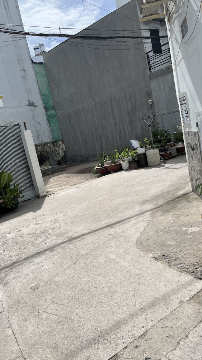 Định cư cần bán nhà 2 mặt tiền hẻm xe hơi đường Thống Nhất, P.11,Q. Gò Vấp